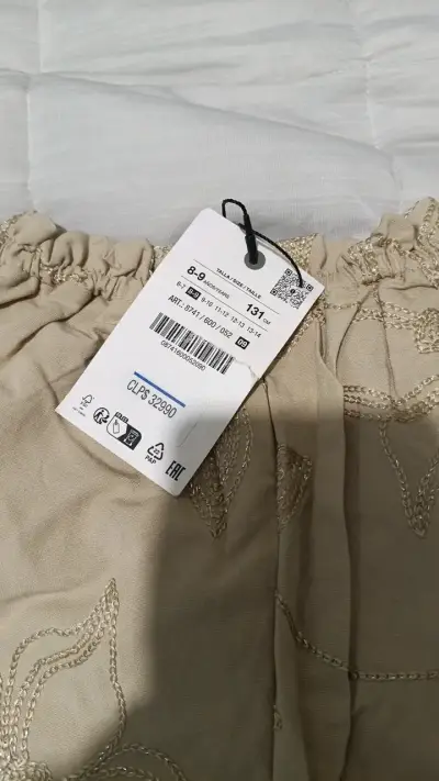 Pantalones beige bordados para niña - miniatura 2