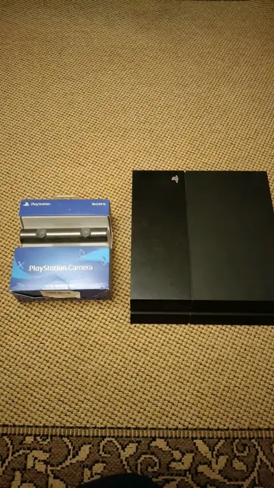 Consola PlayStation 4 con cámara y juegos - miniatura 1