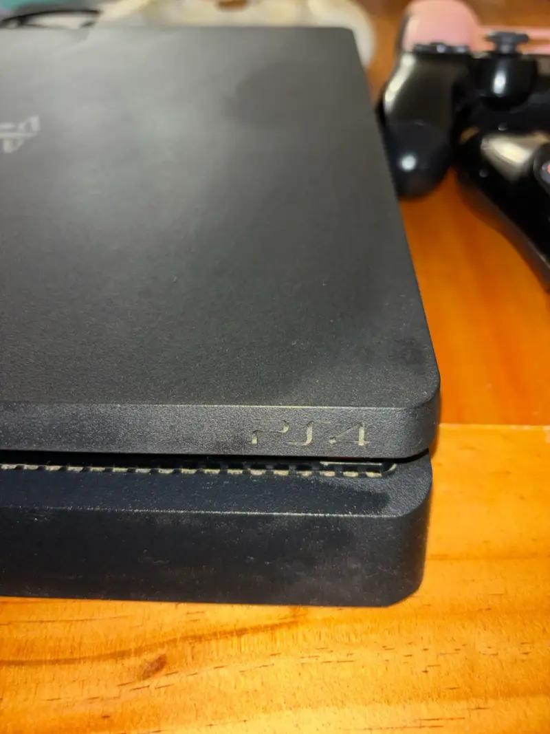 PlayStation 4 + dos controles + 5 juegos - 6