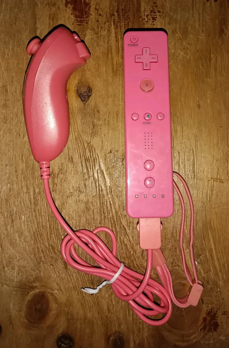 Control remoto y nunchuk rosa para consola