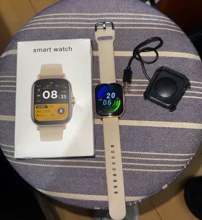 Smartwatch beige con cargador y caja original - miniatura 2