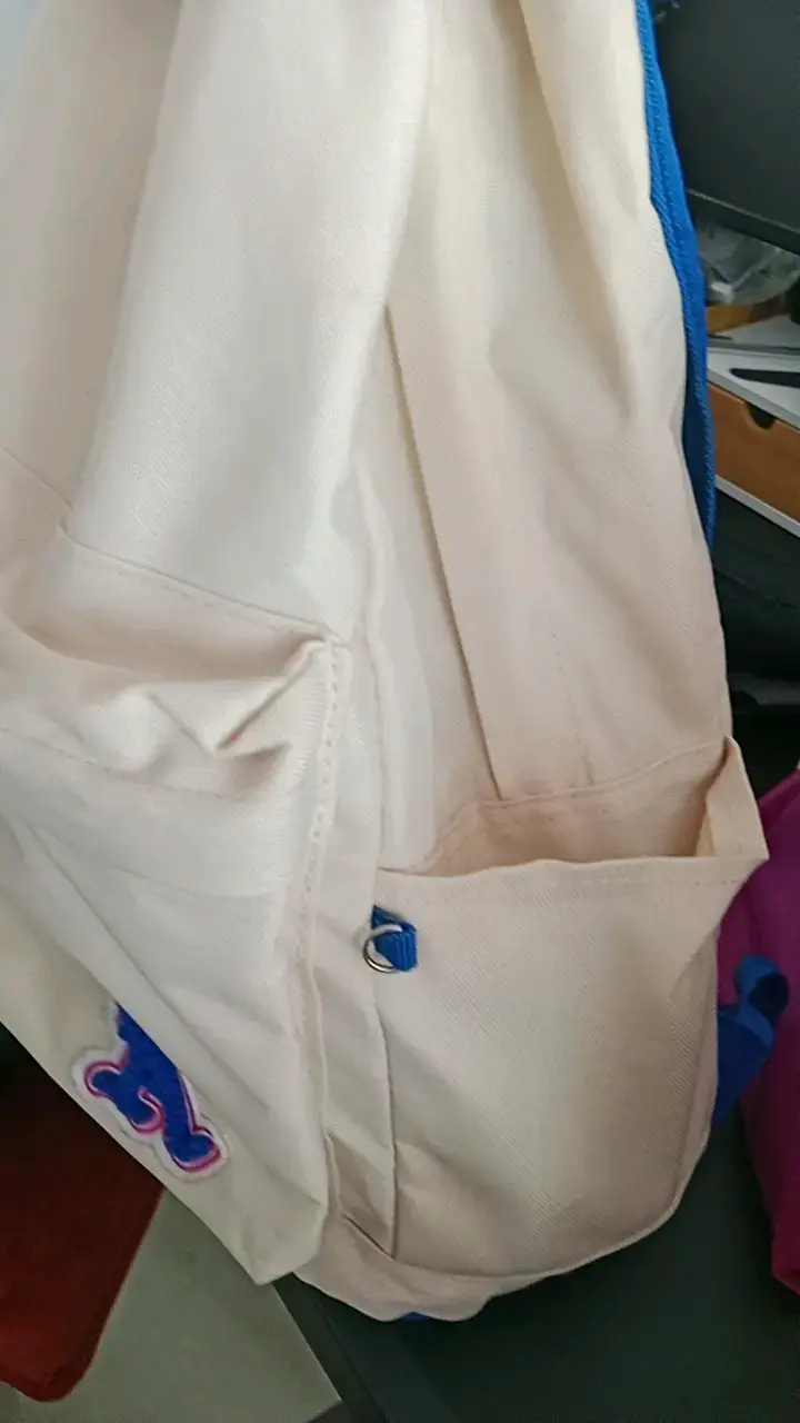 Mochila beige con detalles azules - 3