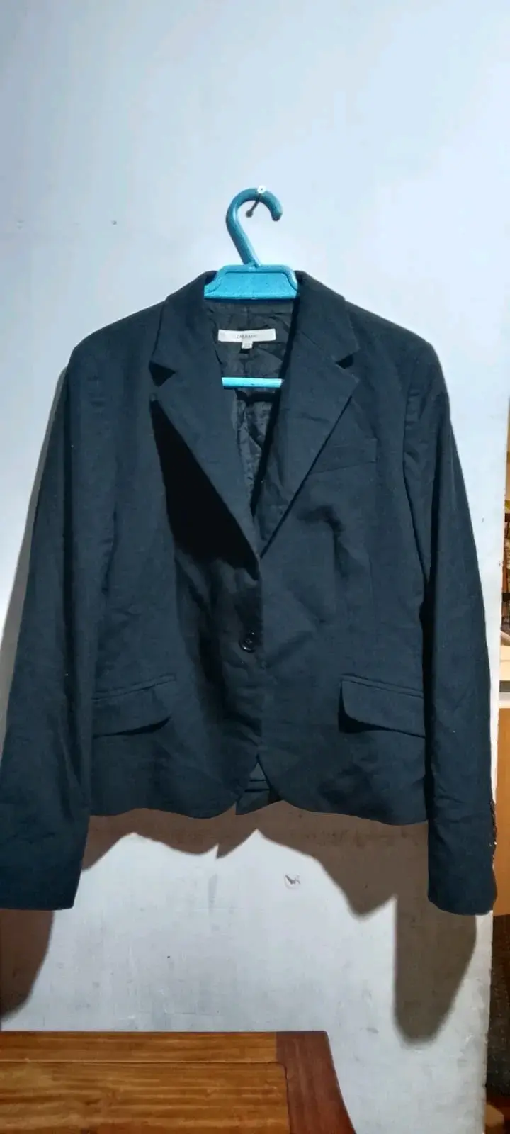 Blazer negro para mujer en buen estado