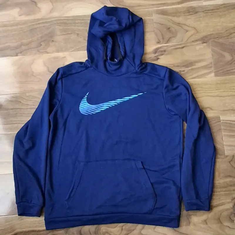 Polerón Nike azul con capucha y logo - 1