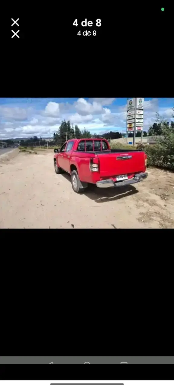 Camioneta Mitsubishi roja en buen estado - 6