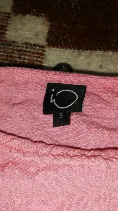 Polera sin mangas rosa marca IO - miniatura 2