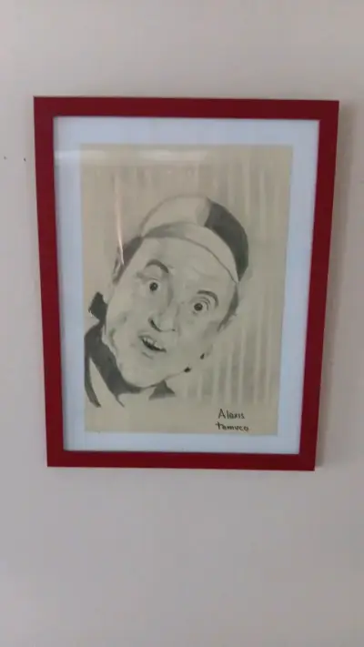 Cuadro con dibujo enmarcado de personaje famoso - miniatura 1