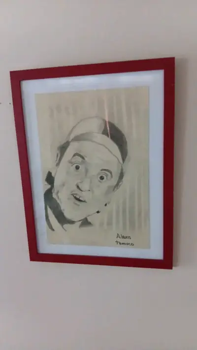 Cuadro con dibujo enmarcado de personaje famoso - miniatura 2