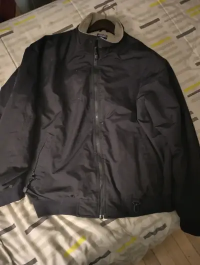 Chaqueta negra con forro polar beige - miniatura 1