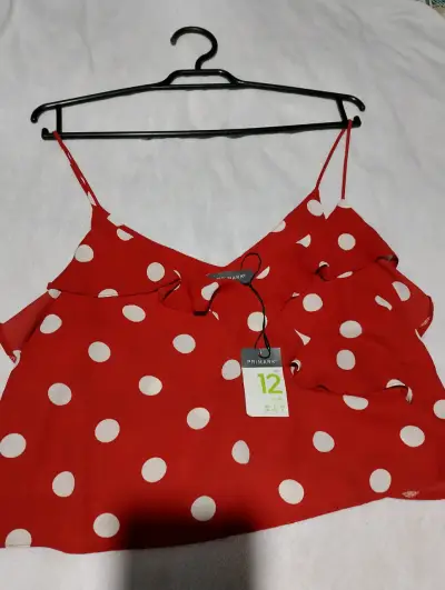 Blusa roja de lunares Primark talla 12 - miniatura 1