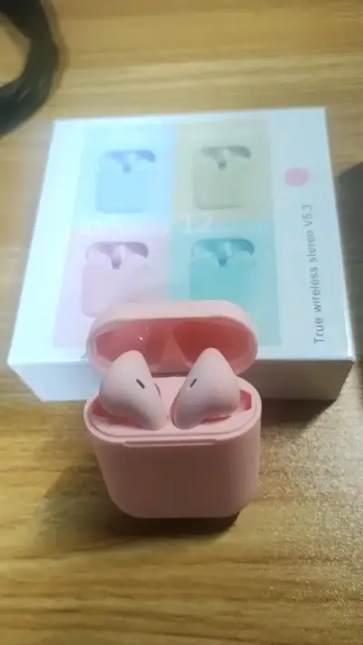 Audífonos inalámbricos rosa con estuche - miniatura 1