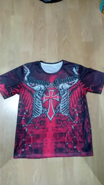 Polera Xtreme Couture con diseño de calaveras - miniatura 1
