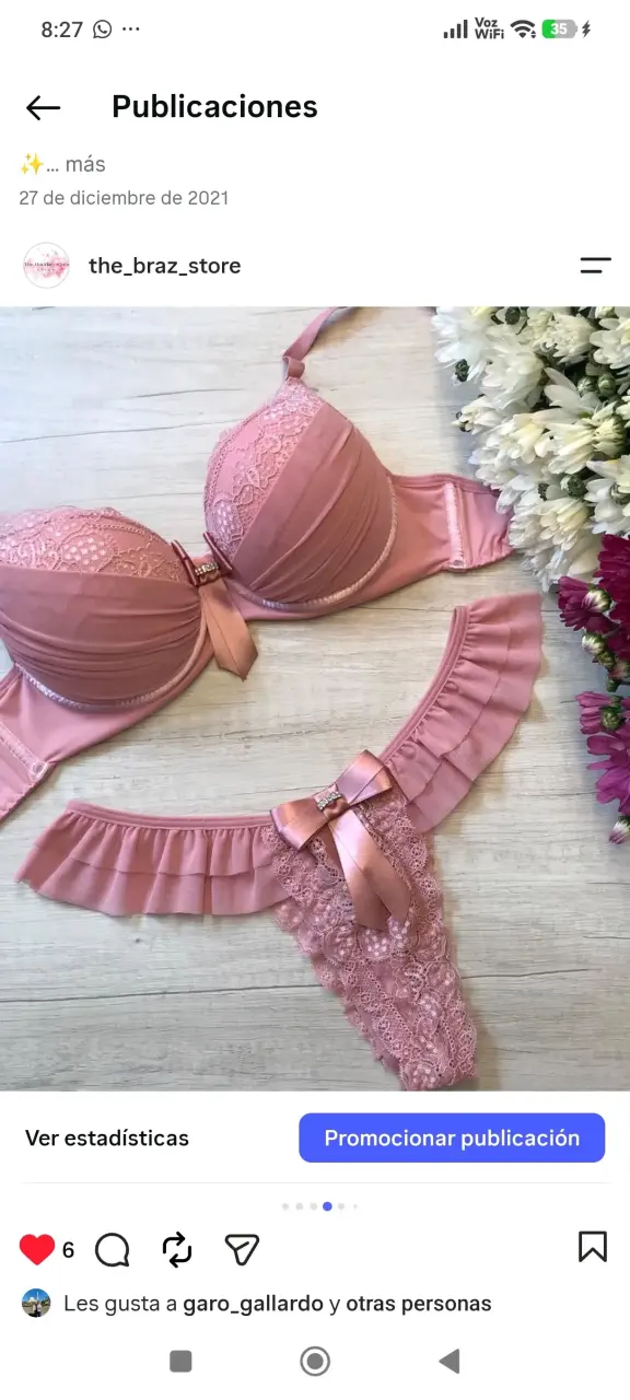 Conjunto de lencería rosa con encaje y lazo - 1