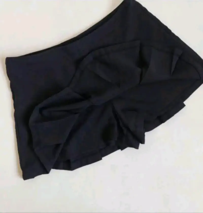 Falda corta negra con pliegues - 2