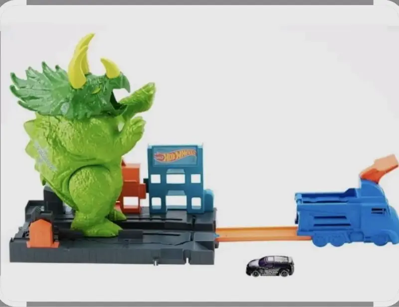 Pista de juego Hot Wheels con dinosaurio