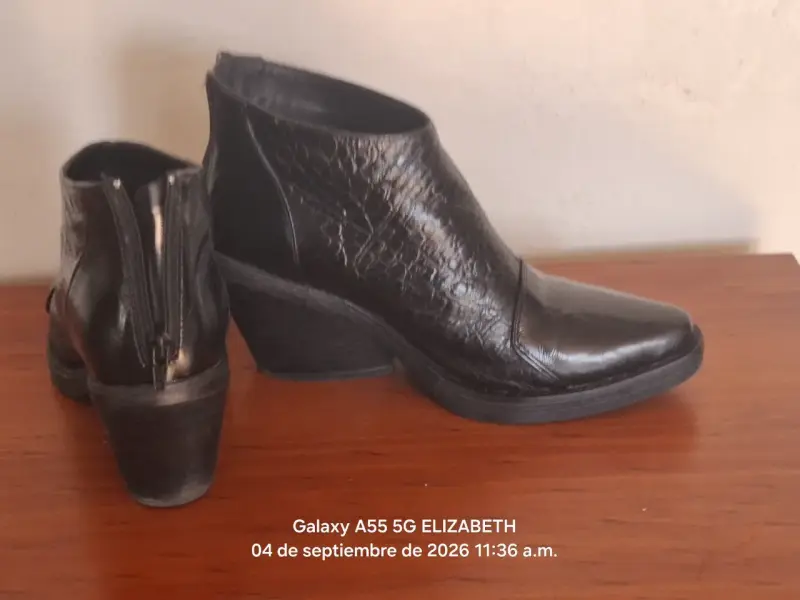 Botines de cuero negro con tacón - 1