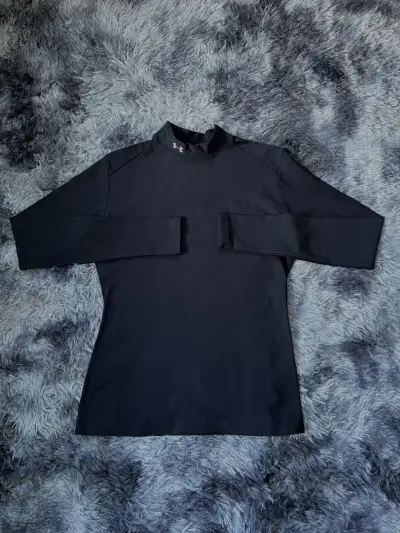 Polera térmica negra Under Armour Mujer - miniatura 1
