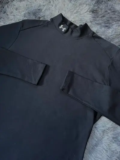 Polera térmica negra Under Armour Mujer - miniatura 2