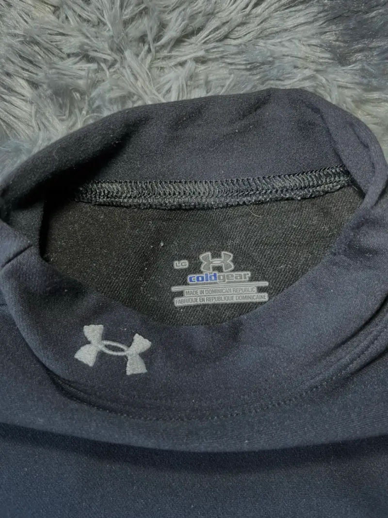 Polera térmica negra Under Armour Mujer - 3
