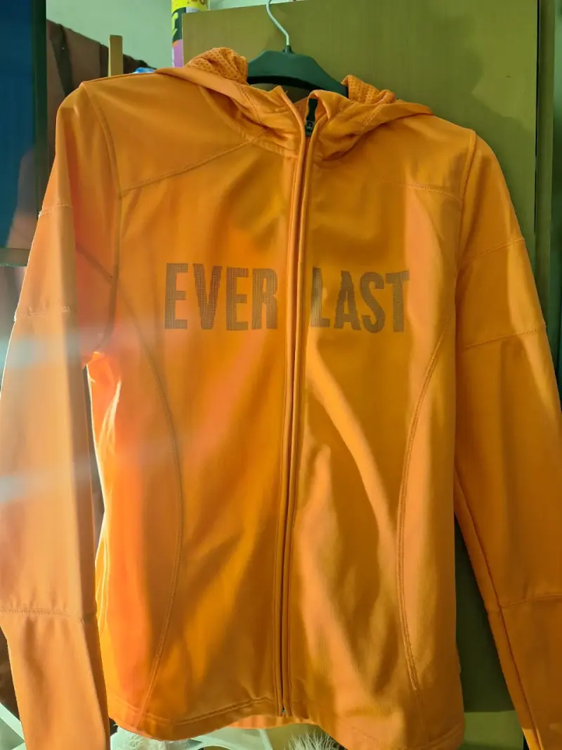 Chaqueta deportiva naranja Everlast con capucha $5 - 1