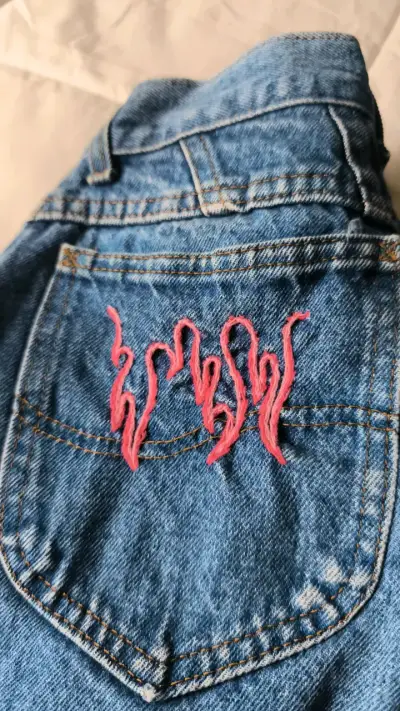 Jeans Lee con bordado rosa para mujer - miniatura 2
