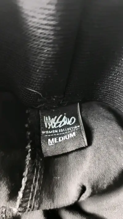 Calzas negras con cinturón para mujer - miniatura 3
