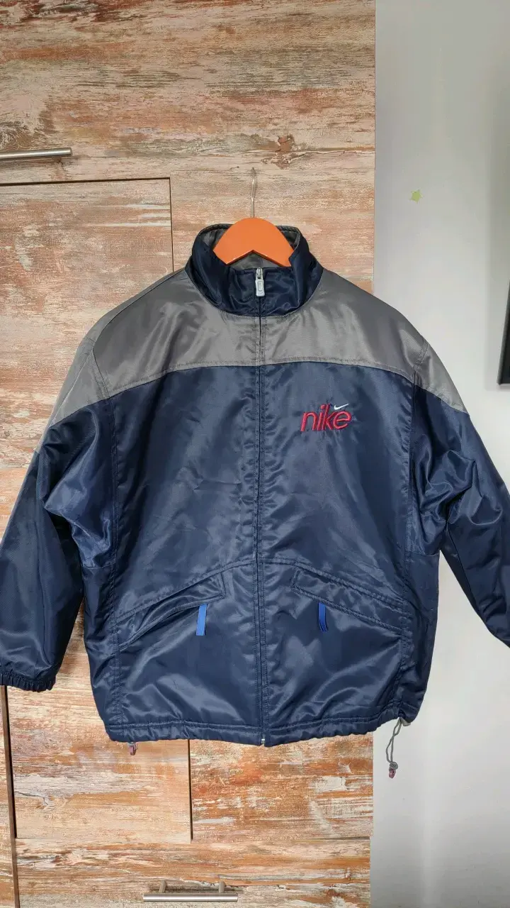 Chaqueta Nike azul con forro térmico - 1