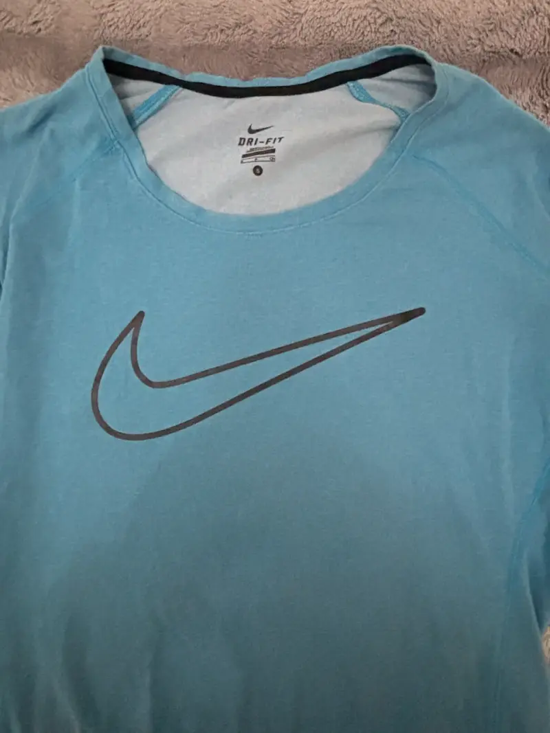 Polera deportiva Nike Dri-Fit azul para mujer - 2