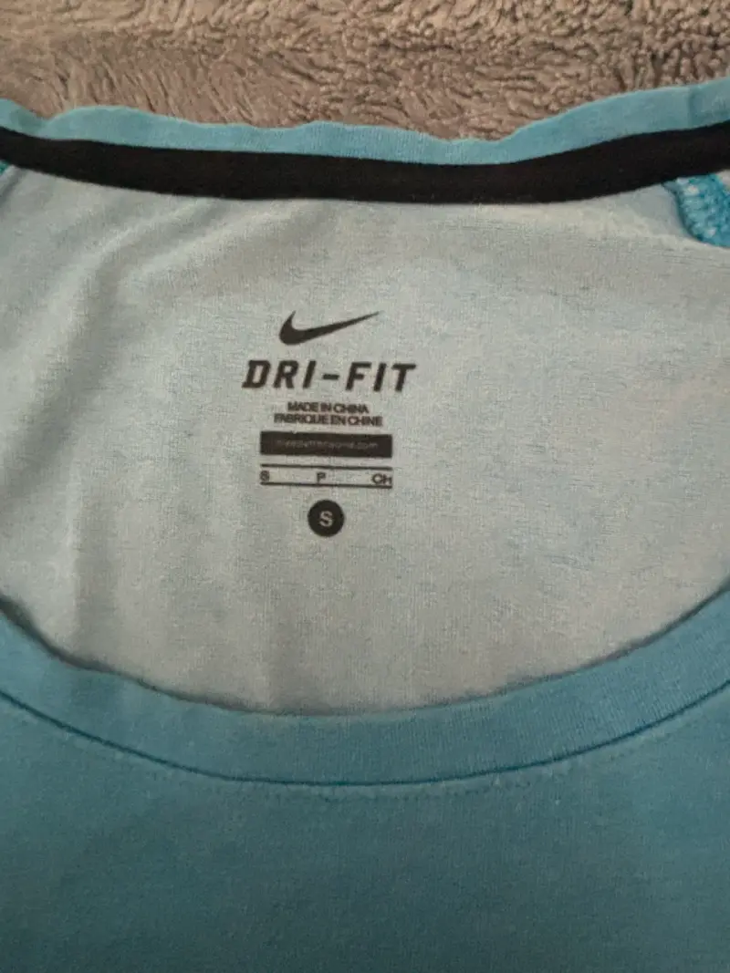 Polera deportiva Nike Dri-Fit azul para mujer - 3