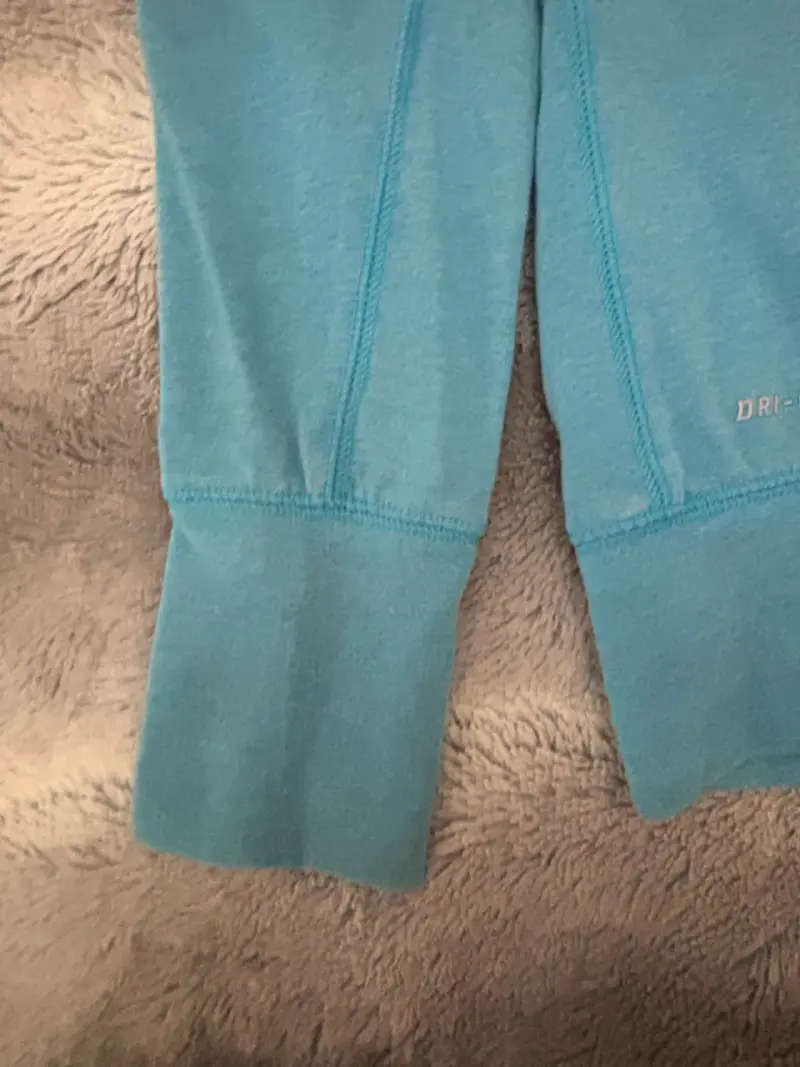 Polera deportiva Nike Dri-Fit azul para mujer - 4