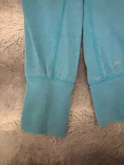 Polera deportiva Nike Dri-Fit azul para mujer - miniatura 4
