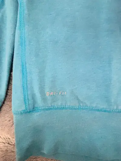 Polera deportiva Nike Dri-Fit azul para mujer - miniatura 5