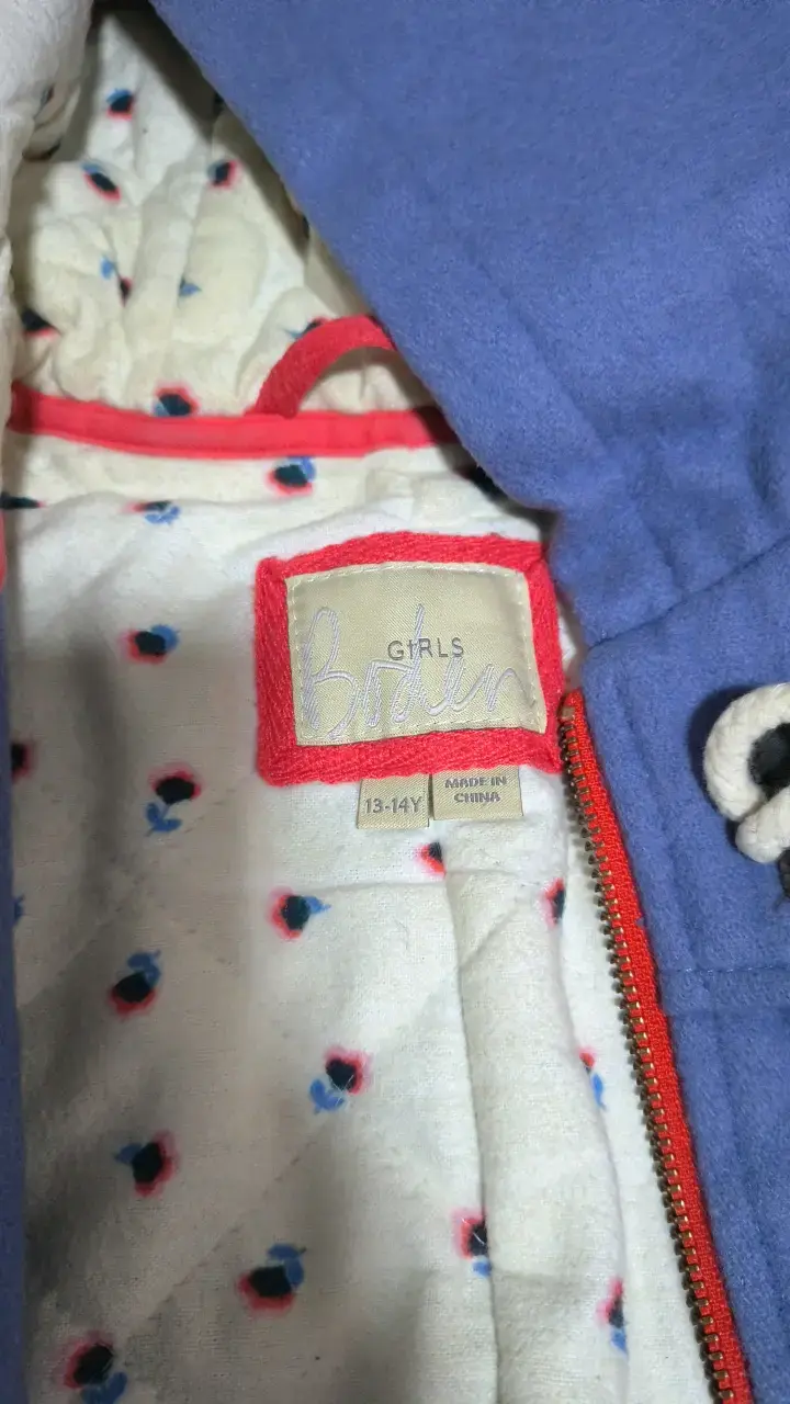 Abrigo azul para niña con capucha y forro estampado - 2