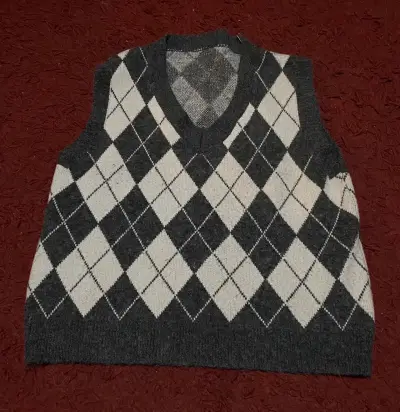Chaleco sin mangas de rombos gris y blanco - miniatura 1