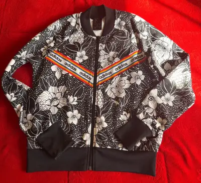 Chaqueta deportiva floral Adidas para mujer - miniatura 1