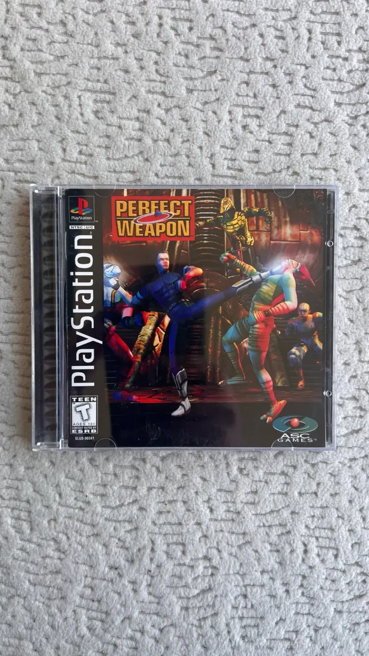 Perfect Weapon PlayStation - 1