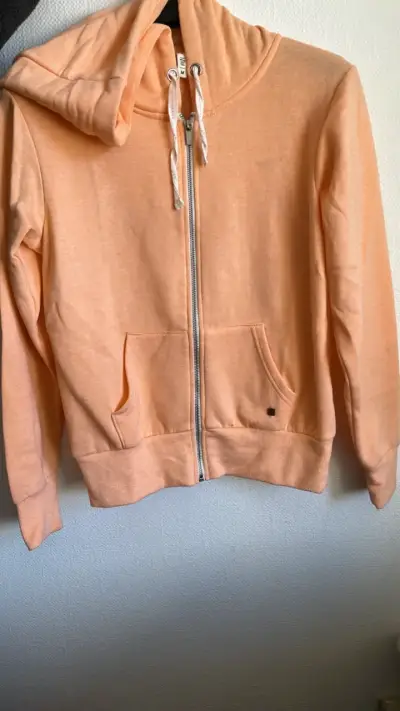 Polerón con capucha color durazno para mujer - miniatura 1