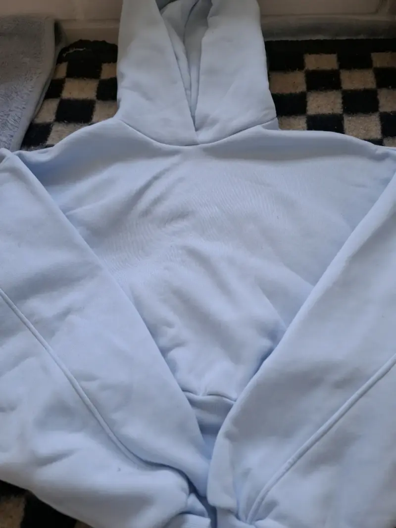 Polerón con capucha azul claro unisex