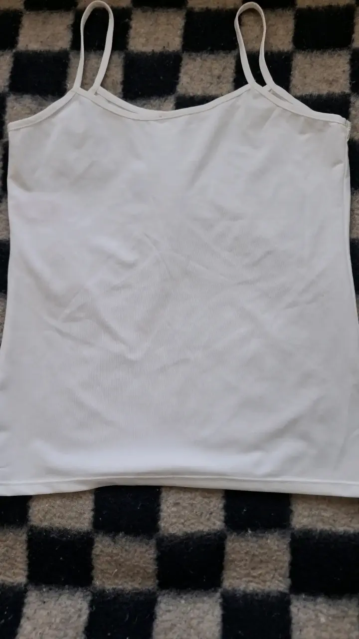 Polera sin mangas blanca para mujer