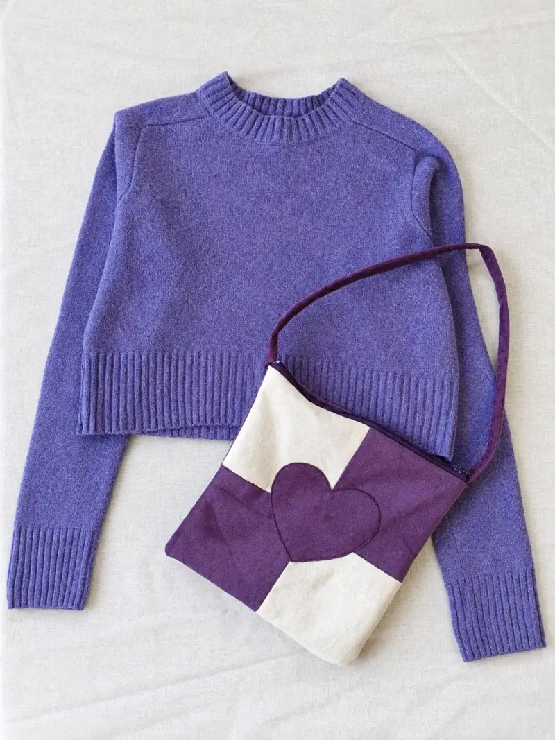 Suéter morado de lana para mujer