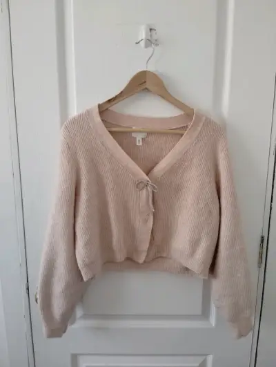 Chaleco de punto rosa claro H&M con lazo - miniatura 1