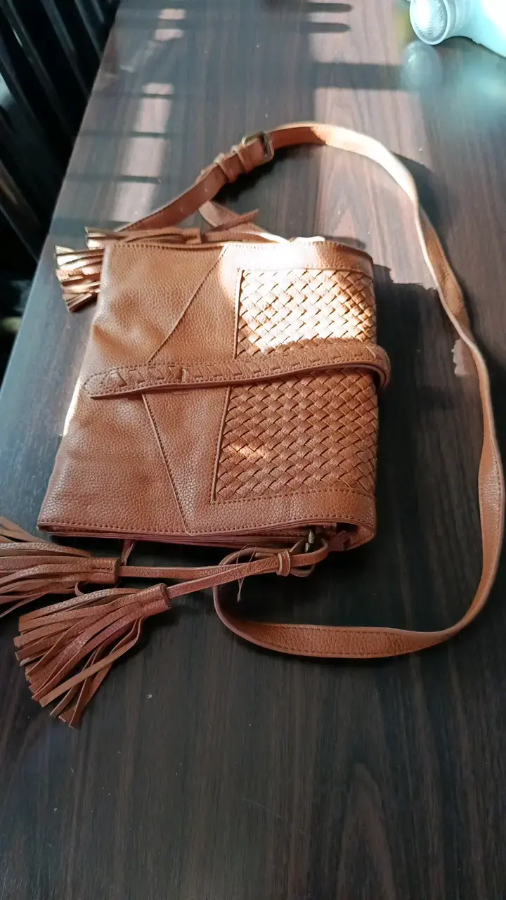 Cartera de cuero marrón con flecos - 1