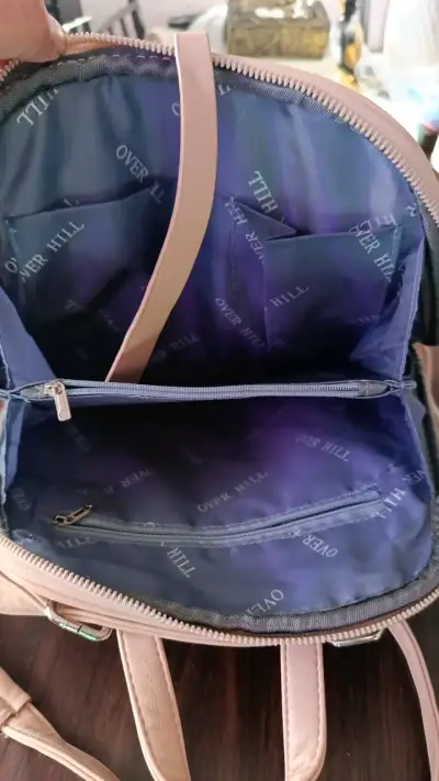 Mochila beige estilo casual con múltiples compartimentos - miniatura 3