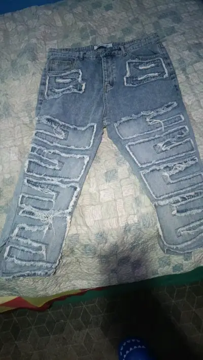 Jeans Diabolo con diseño rasgado para hombre - miniatura 1