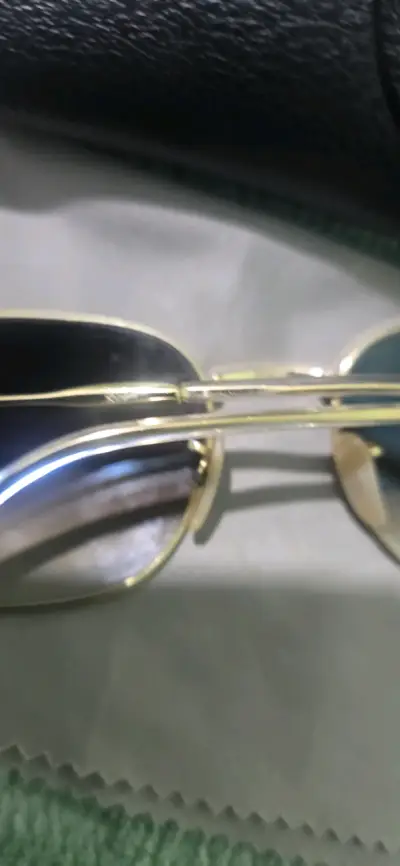 Gafas de sol Ray-Ban doradas con estuche - miniatura 6