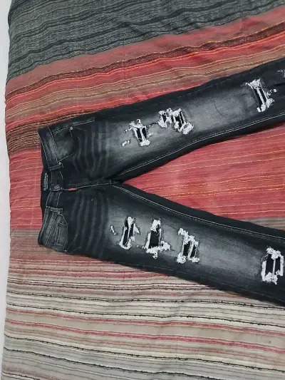 Jeans negros desgastados para hombre - miniatura 1