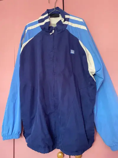 Chaqueta deportiva azul Wilson para hombre - miniatura 1