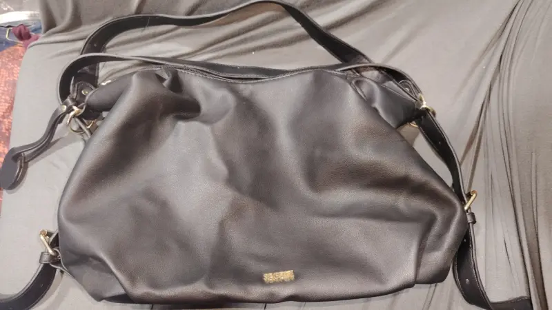 Cartera secret buen eatdo una semana de uso - 1