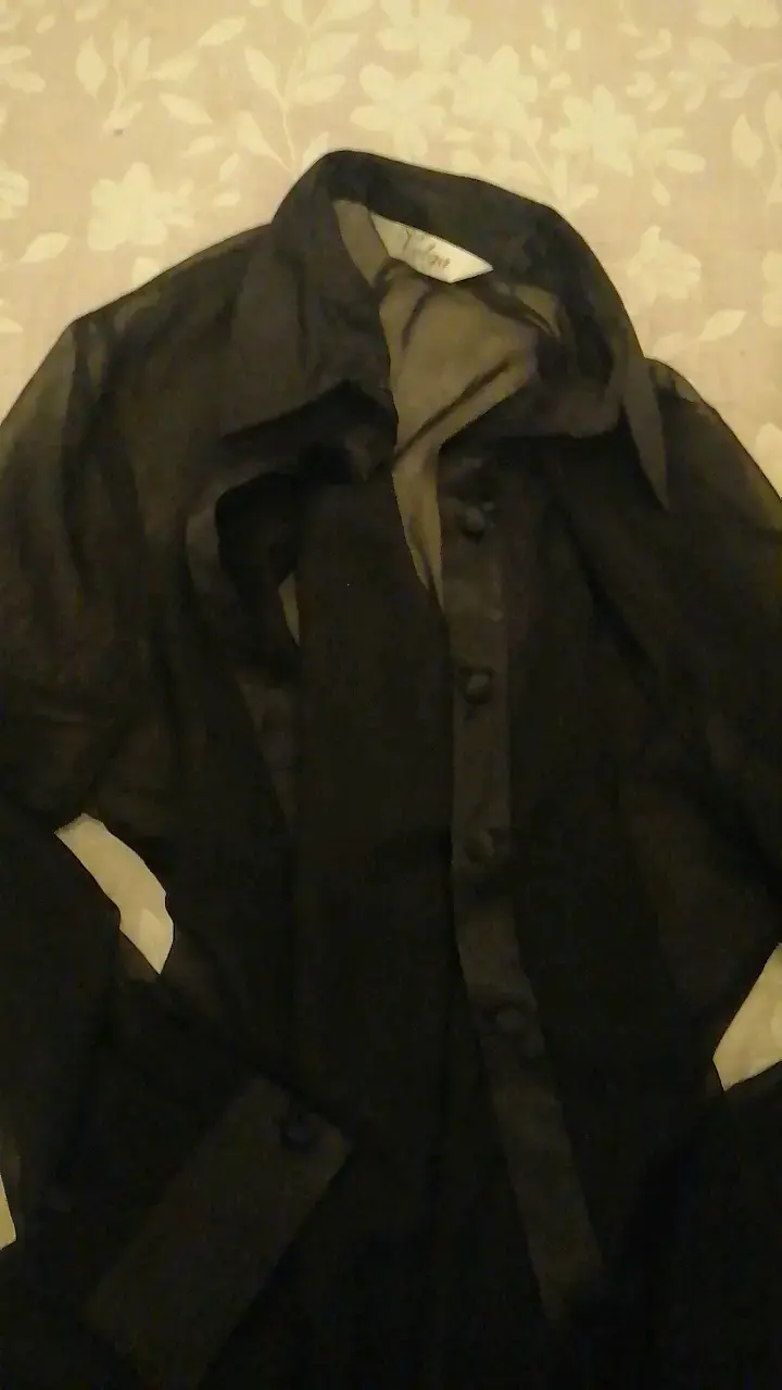Blusa negra transparente elegante para mujer