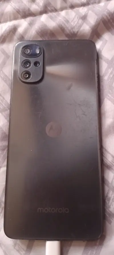 Teléfono Motorola con pantalla rota - miniatura 1